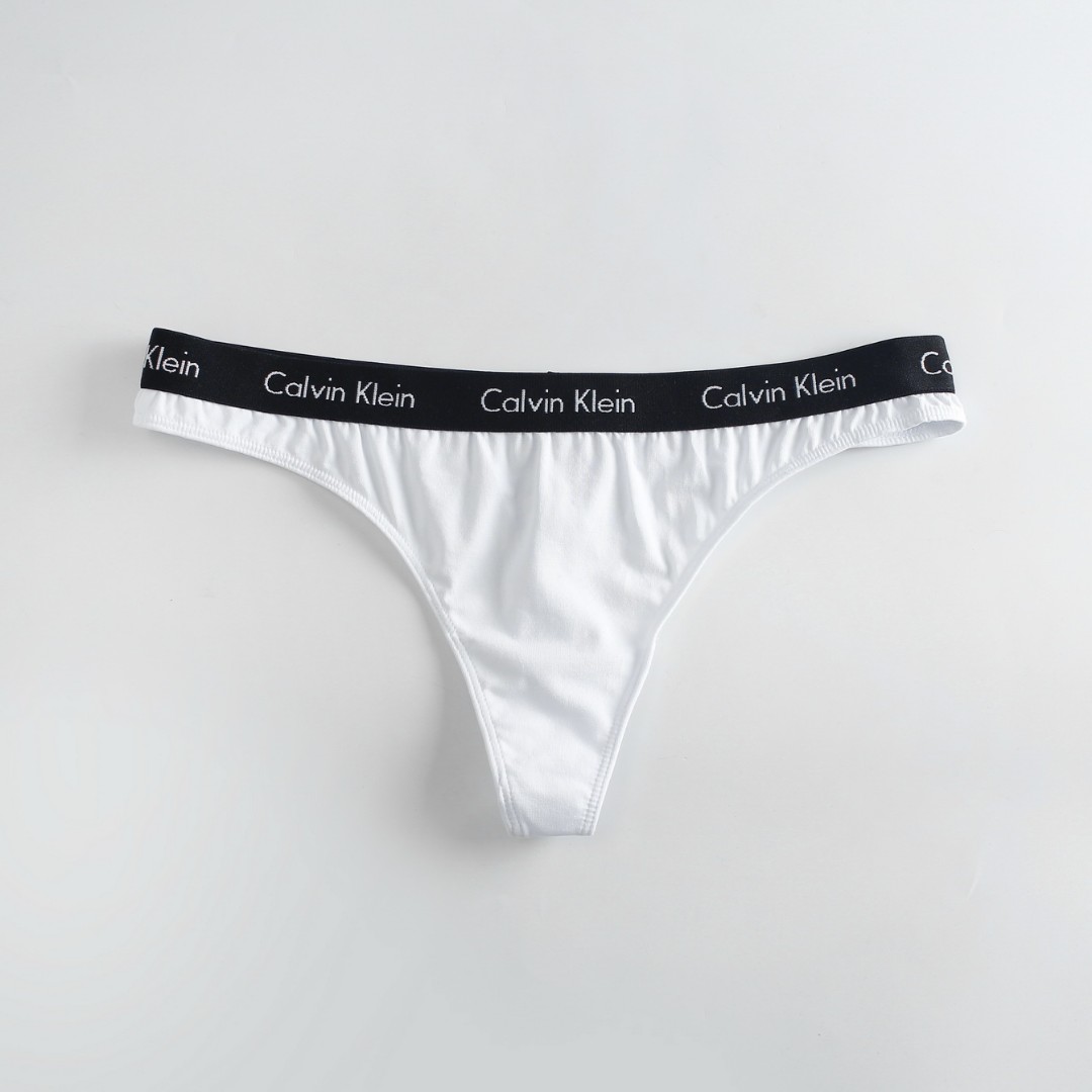 Стринги Calvin Klein Black Empire белые фото 1