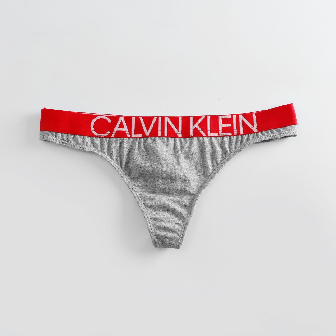 Стринги Calvin Klein City серые фото 1