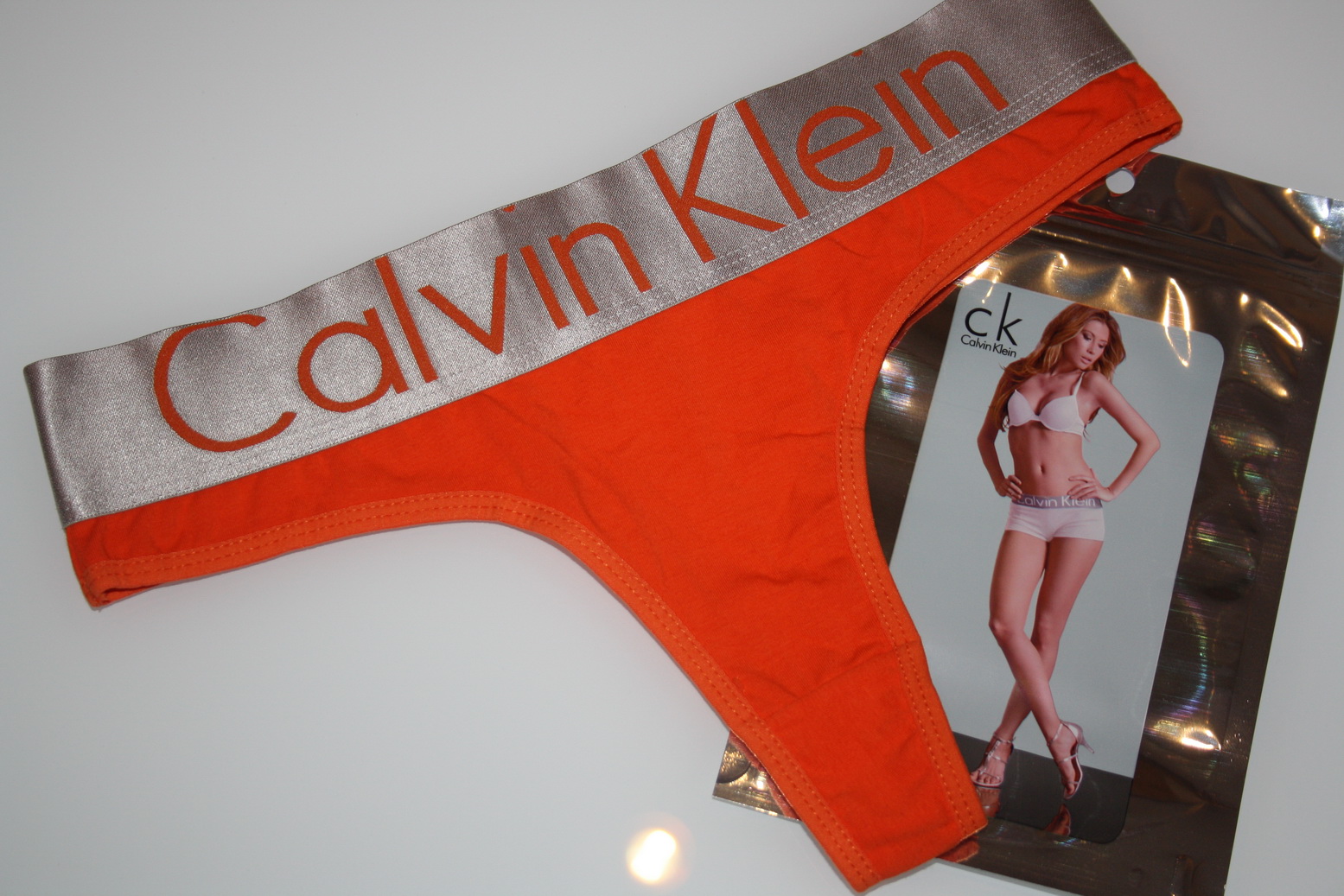 Женские стринги оранжевые Calvin Klein Steel Orange фото 1